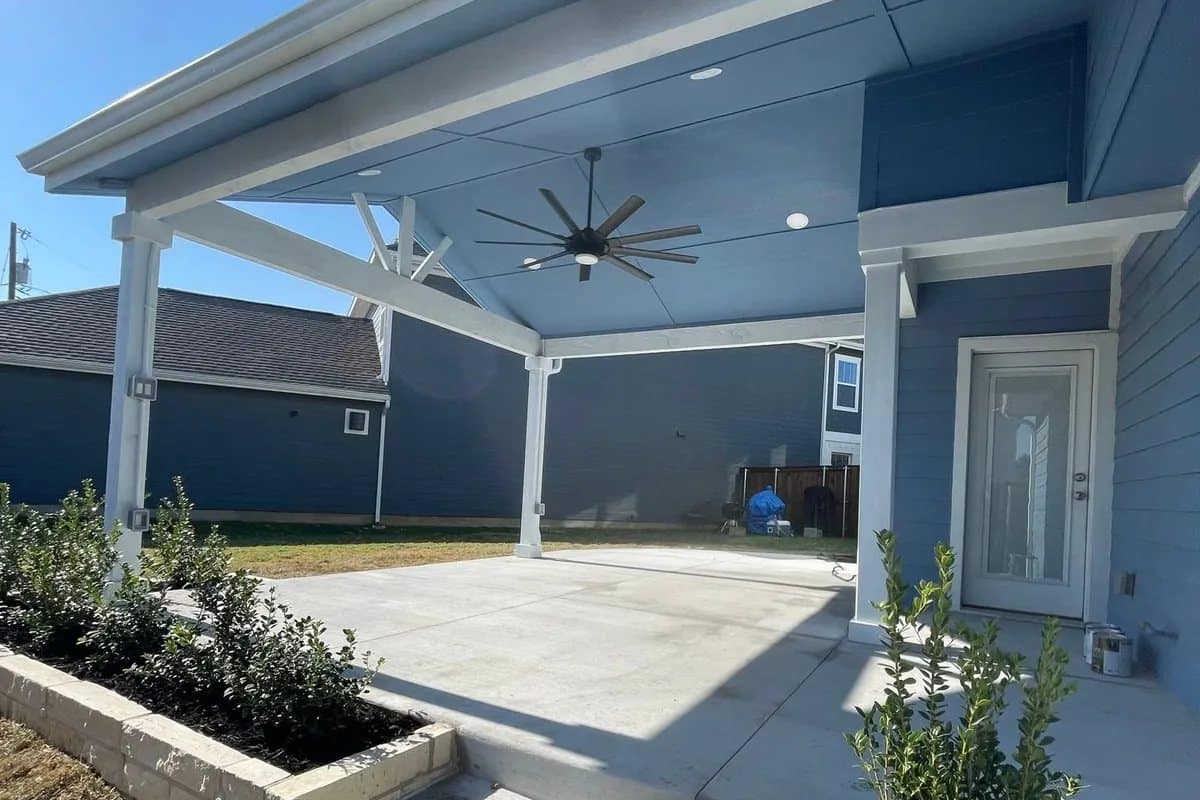 white patio cover limestone bed and steps